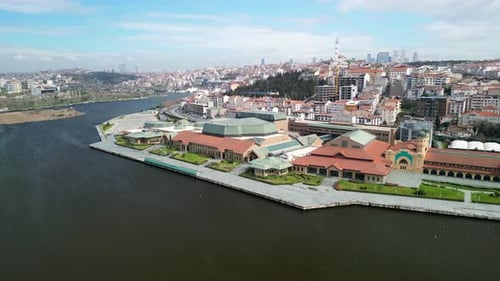Istanbul Halic Congress Center and Golden Horn Channel, fly back shot