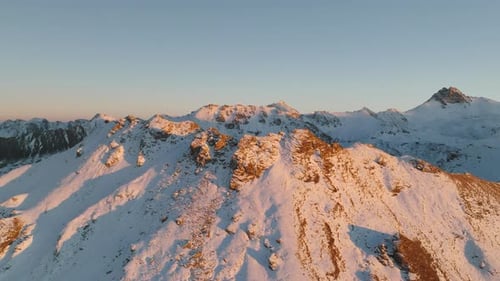 Mont Noble Mountain In Swiss Pennine Alps During Winter At Dusk In Switzerland. - aerial shot