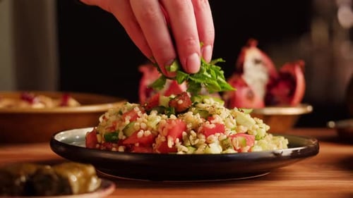 Salad Garnishing With Fresh Herbs, Close Up