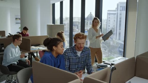 Collaborative Team Working at Modern Office Workplace
