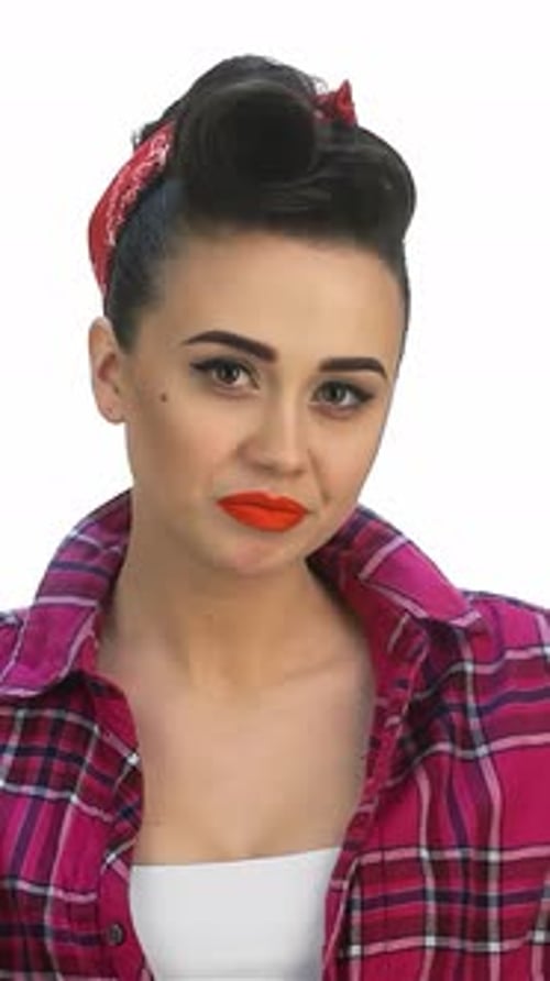 Confident Young Retro Pinup Girl Striking a Bold Pose