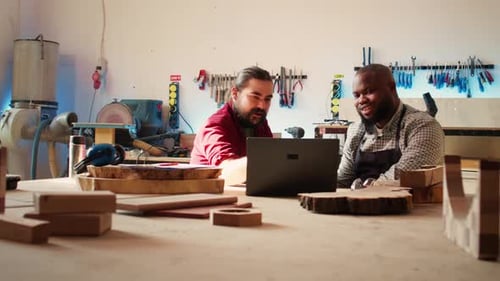 Collaborative Woodworkers Using Technology in Workshop