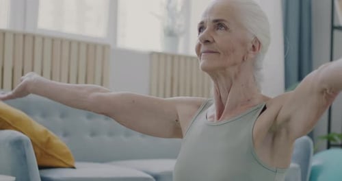 Senior Woman Practicing Yoga for Health and Fitness
