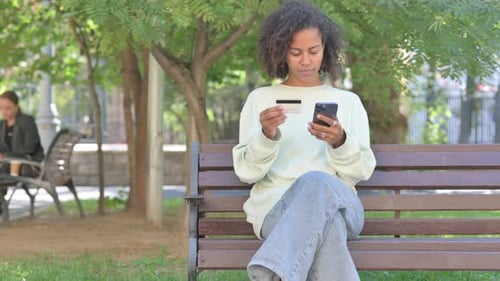 Casual African Woman Shopping Online Outdoor