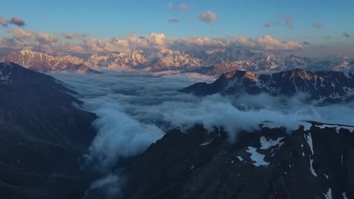 Majestic Mountains and Clouds at Sunrise, Aerial View
