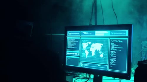 Wanted Hackers Coding Virus Ransomware Using Laptops and Computers in the Basement Cyber Attack