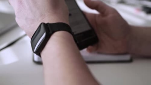 Man scrolling social media in smartphone