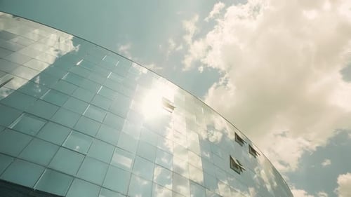 Modern Glass Facade of an Office Building with Open Windows
