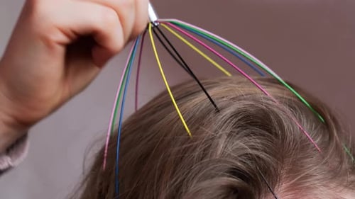 Unrecognizable Woman Enjoying Scalp Massage Through Massager at Home Close Up of Using Scalp