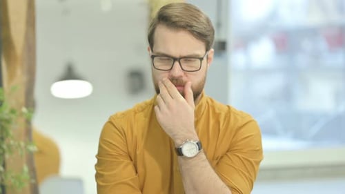 Man Ponders in Office