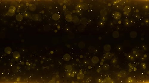 Golden glitter sparkling bokeh lights on a dark background. Festive, luxurious, magical abstract for