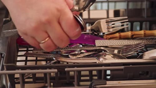 Placing Silverware in Dishwasher Utensil Basket