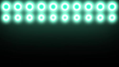 Bright green festive lights sparkle against dark background, holiday magic