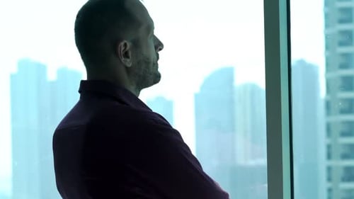 Successful Businessman Admire View From Window at Home 30s
