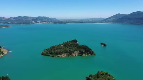 Aerial shot of the summer landscape Colbun lake near the mountains