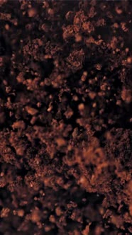 Ground Coffee Flies Up and Falls Down Filmed on a Highspeed Camera at 1000 Fps