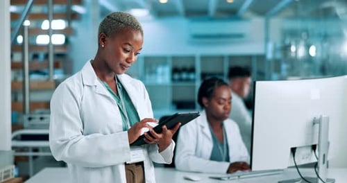 Scientists Working in Modern Medical Research Laboratory