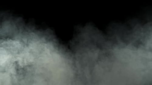 Misty, billowing smoke against a black backdrop