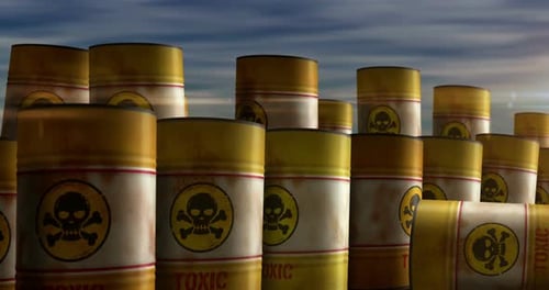 Toxic warning barrels in row