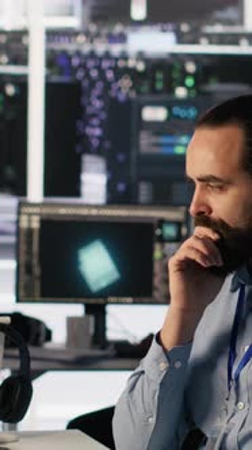 Vertical Video Data Center Technician Discussing with Coworker in Workspace