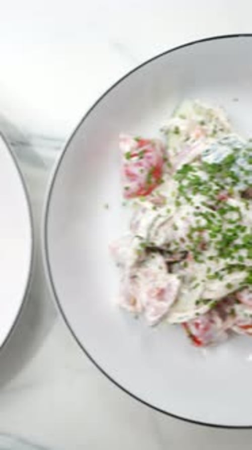 Assortment of Fresh Salads in White Bowls