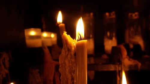 Candles burning in church Slow Motion