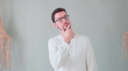 Young man ponders has idea, brainstorm smart consideration. Expression emotion young hipster with be