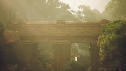 Misty Morning View of an Ancient Stone Bridge Surrounded By Lush Greenery