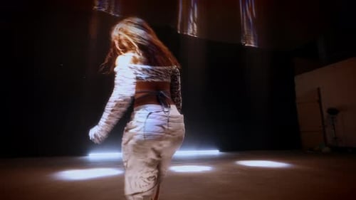 Powerful Hip Hop Dance By Woman With Matrix Beam Lighting In Studio