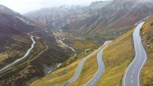 Aerial View on Grimselpass high mountian alpine road and Swiss Alps in background . Furka pass, Swit