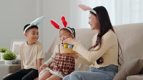 Easter Family Joy A Cheerful Mother and Kids with Bunny Ears Celebrate Easter at Home