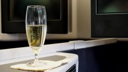 A Champagne in Business Class, Bubbles Flowing from bottom to top