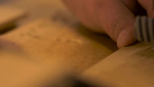 CNC Router Cutting Wood Piece in Close Up