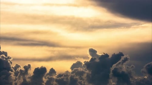 Aerial view of beautiful sunrise sky with clouds on a summer day.