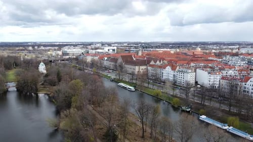 Beautiful houses by the river in Berlin. View from a drone