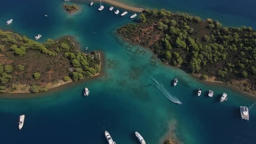Turquoise Tranquility Secluded Bay Brimming with Boats Serene Beauty of Turquoise Bay Filled with