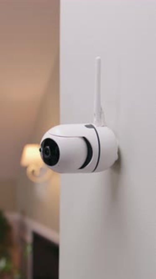 Security Camera on Wall in Modern Apartment
