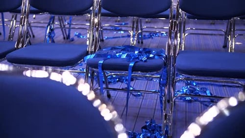 Empty Blue Chairs After Graduation Ceremony Event