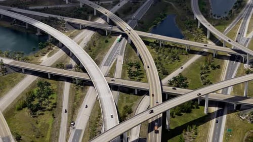 A Raised Highway Interchange in Miami Bustling with Moving Vehicles Showcasing US Transportation