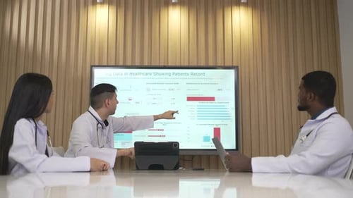 Medical Team Meeting and Discussing Data