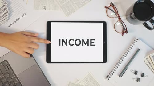 INCOME DISPLAYING ON A TABLET SCREEN