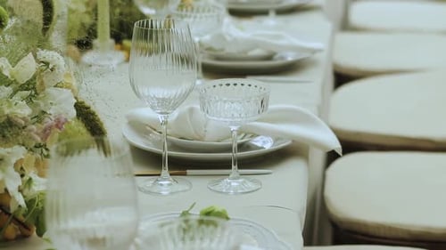 Elegant Wedding Table Setting with Floral Decorations