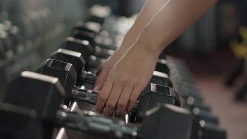 Close up hands of Active fitness trainer or athlete male exercise for health care at fitness or gym
