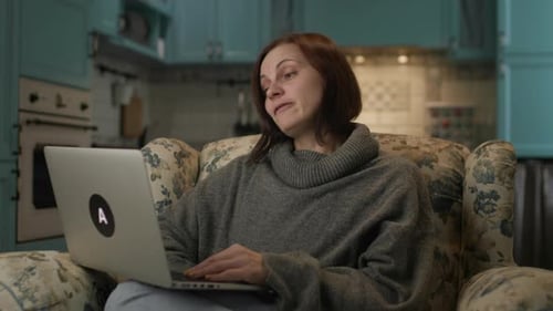 Woman Having a Video Call on Laptop