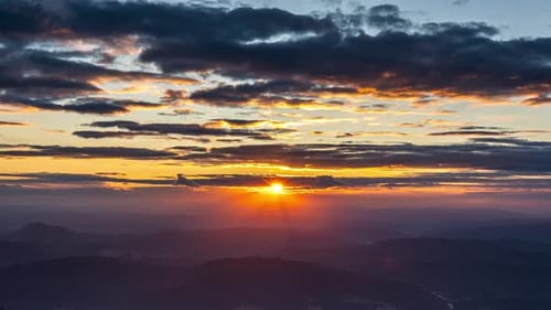 Scenic Mountain Sunset in Golden Hour