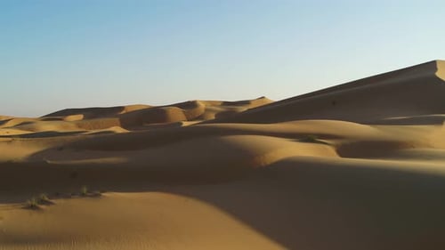 Sunset at the high sand dunes of Merzouga, Morocco. Handheld shot.