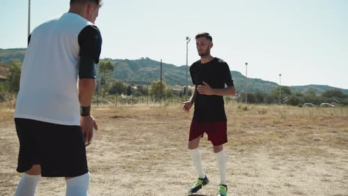 Soccer Player Practicing The Volley Pass With Both Feet