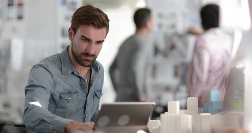 Designers working in an open plan office space