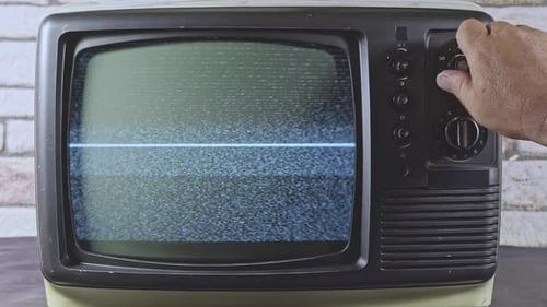 Tuning An Old Television with Static Screen