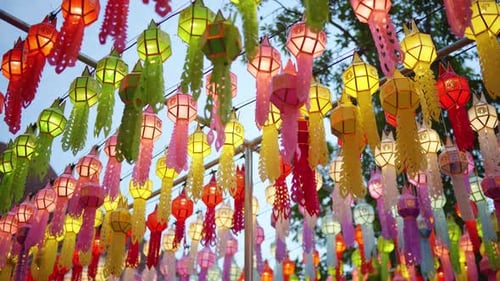 Hanging one hundred of multi colours lantern light lamp for Loy Krathong Festival in Lampune.